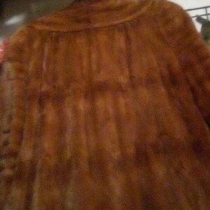 Mid length mink past the knee's beautiful mink jacket